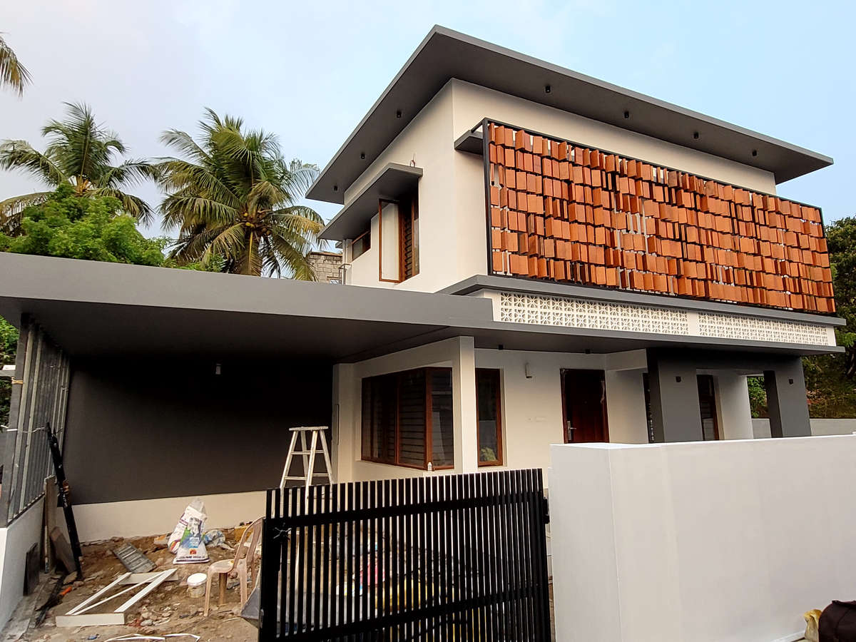 Exterior Designs by Painting Works mathew Mo, Thrissur Kolo