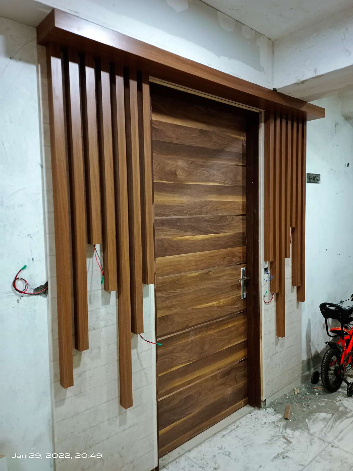 beautiful main gate design wooden panel.