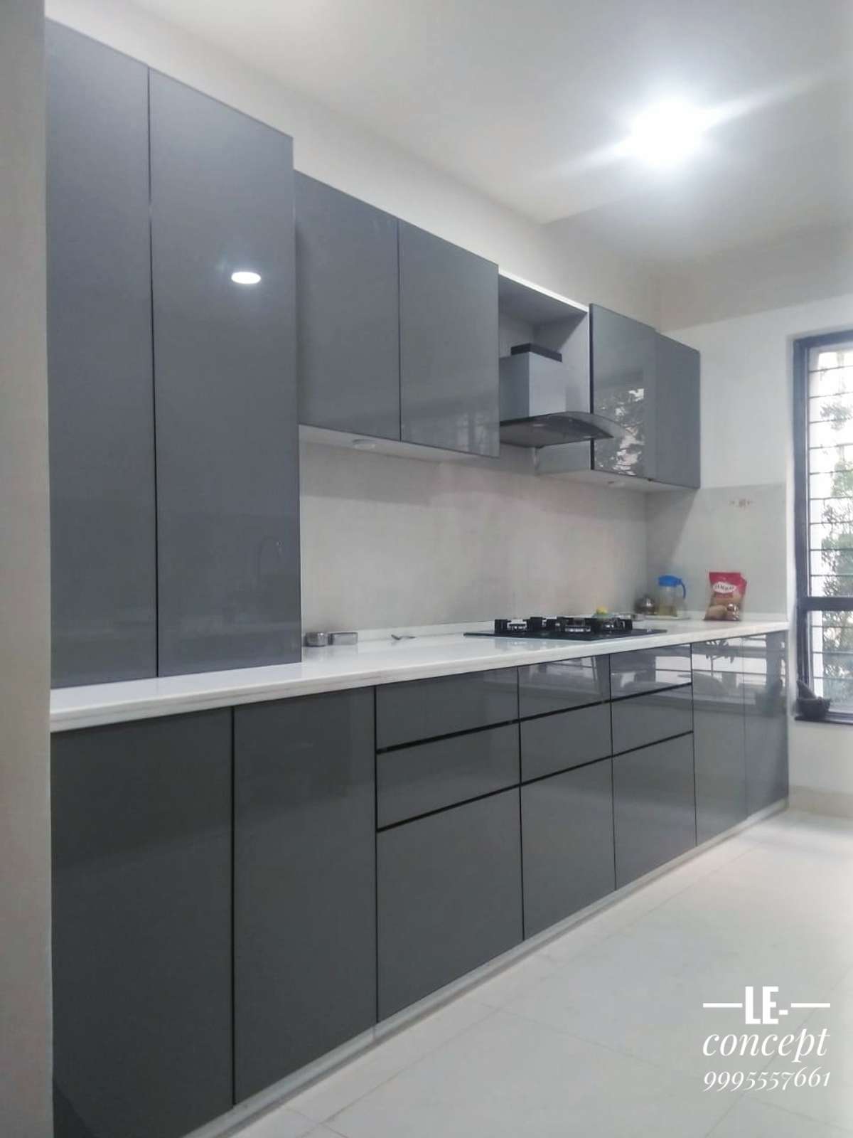 laquered glass kitchens and cabinets in an affordable price with long guarantee, contact us 9995557661