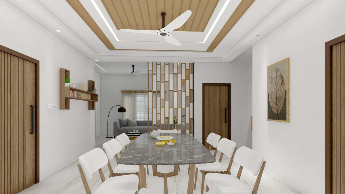 Interior design for Mr.Ansar 
Place : Ambalappady
Living and dining rooms
#InteriorDesigner #LivingroomDesigns 
#diningroom 
#partitiondesign 
#FalseCeiling 
#cupboards 
#StaircaseDecors 
#WoodenCeiling 
#architecturedesigns 
#keralaarchitectures