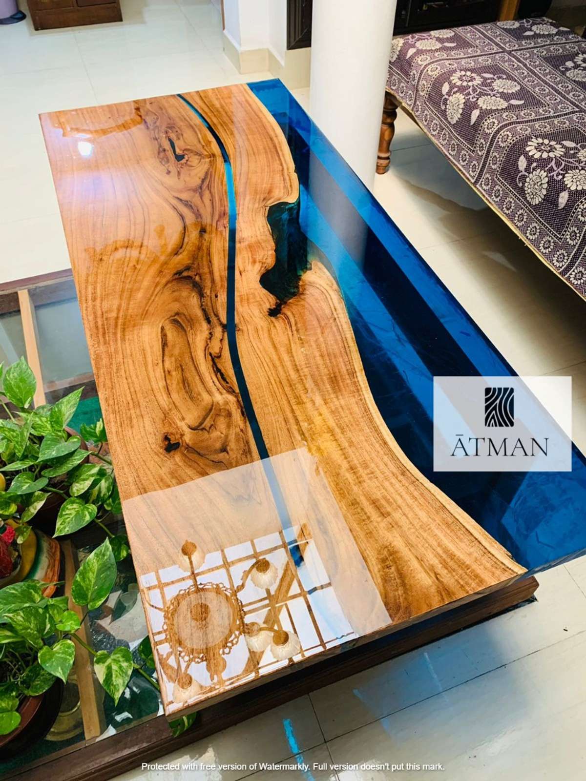 40-year old Asian Walnut with a deep blue pigment finished to a high mirror-like gloss Resin custom made to a size of 4.5 feet x 2 feet with powder coated black frames.  

#epoxytables
#LivingroomDesigns  #LivingRoomTable  #CoffeeTable  #HomeDecor  #customisedfurniture  #DiningTable #InteriorDesigner #keraladesigns