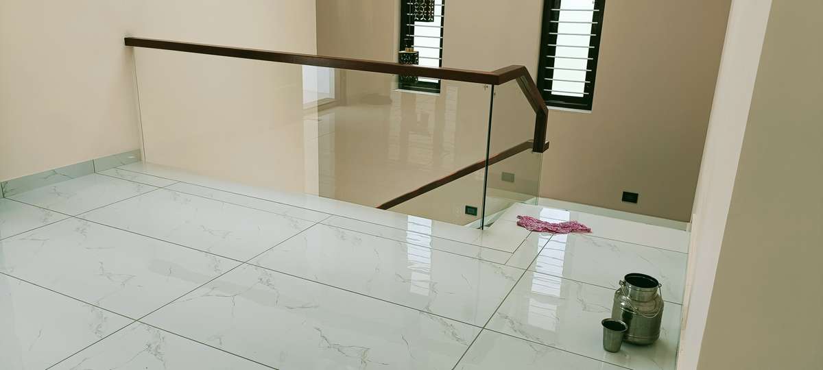 wood and glass #GlassHandRailStaircase
#premiumpots #StaircaseDecors #GlassStaircase