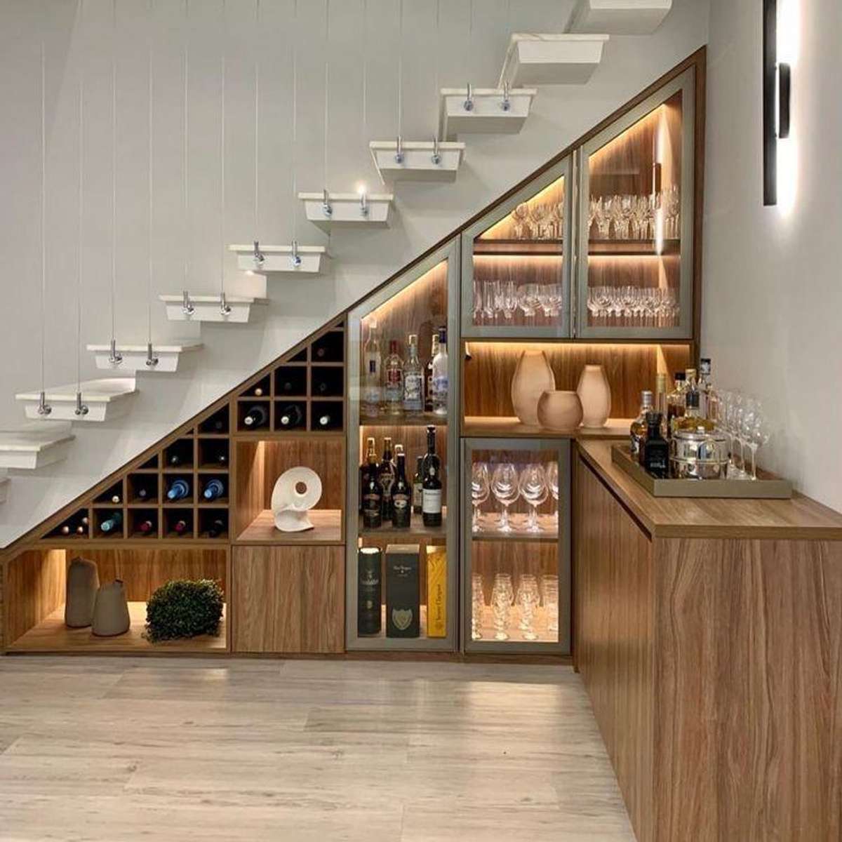 Ideas to utilise space under staircase. For architectural plans    and Interior design contact us @A&P Projects
#Architect #InteriorDesigner #StaircaseDecors #creative #HouseConstruction #callon8287002506