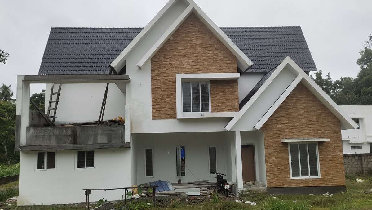 Exterior Designs by Building Supplies MGM WATERPROOFING, Kottayam Kolo