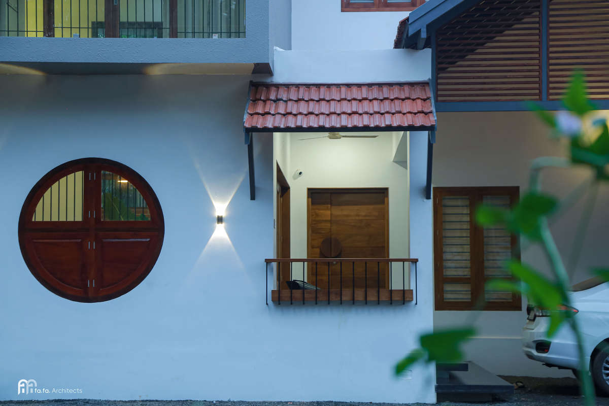 2750 Sqft | Vazhakkad, India

Client: Shameem ok & Shamla hamza
Project Category: Residential
Plot Area: 23 Cents
Area: 2750 Sqft
Location: Vazhakkad, India

Architect: fafa Architects, Calicut, India
@fafa.architects
Contact: +91 8086701493, +91 9567587306
email: fafa.architects@gmail.com

Awaaz is a tropical modern Kerala residence located in the Malabar region of Kerala with an Built up Area 2750 Sq.Ft. The house is planned in a linear arrangement, according to site conditions. The 23 cent site has a wide view of green field, which is utilized by giving patios and balconies. The house has 4 attached bedrooms, with a central courtyard to which every door of the house opens. The skylight courtyard gives enough ambient lighting inside common spaces. The green indoor courtyard is the central attraction of the house. The open theme concept we adopted here lets the flow of enough light inside the house.

Kolo - Indiaâ€™s Largest Home Construction Community ðŸ� 

#home #keralahouse #residence