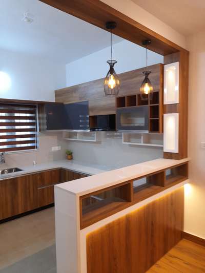 Kitchen, Lighting, Storage Designs by Interior Designer Prasannan Prasannan. g, Thiruvananthapuram | Kolo