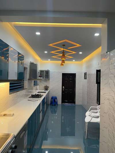 Ceiling, Kitchen, Lighting, Storage, Flooring Designs by Interior Designer H2O CONCEPT  INTERIOR, Kozhikode | Kolo
