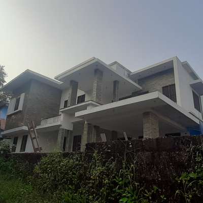 Exterior Designs by Contractor id  architects and interiors , Kannur | Kolo