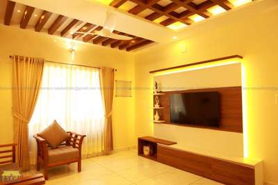 Living, Storage Designs by Interior Designer Nalukettu  interiors , Thiruvananthapuram | Kolo