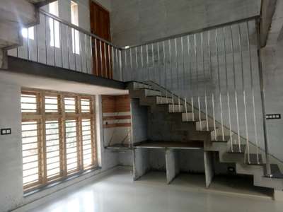 Staircase, Storage Designs by Interior Designer സുരേന്ദ്രൻ സുരേന്ദ്രൻ, Palakkad | Kolo