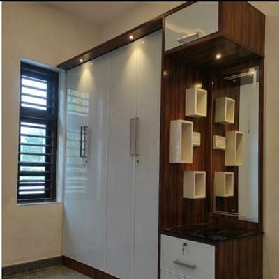 Storage, Lighting Designs by Interior Designer Jubair vazhakkad, Malappuram | Kolo