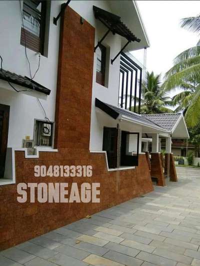 Exterior Designs by Architect STONEAGE Laterite tile, Kannur | Kolo