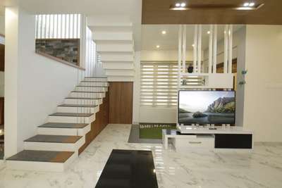 Flooring, Lighting, Living, Staircase, Storage Designs by Architect capellin projects, Kozhikode | Kolo