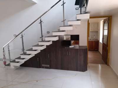 Storage, Staircase Designs by Interior Designer Prasannan Prasannan. g, Thiruvananthapuram | Kolo