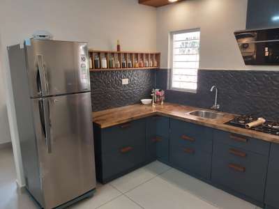 Kitchen, Storage Designs by Contractor Martin Joseph, Kottayam | Kolo