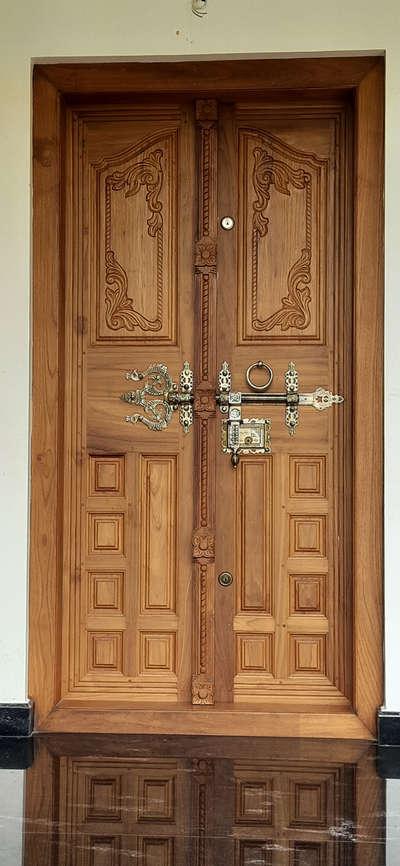 Door Designs by Carpenter Binu Kodikuthi, Idukki | Kolo