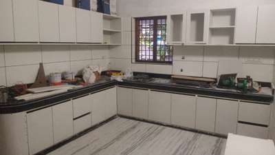 Kitchen, Storage Designs by Carpenter Kanchpal and RAJU Moriye, Malappuram | Kolo