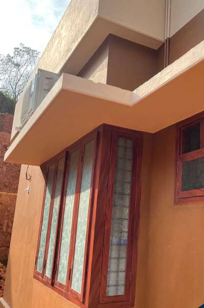 Exterior Designs by Building Supplies Steeldoors Steel windows, Kozhikode | Kolo