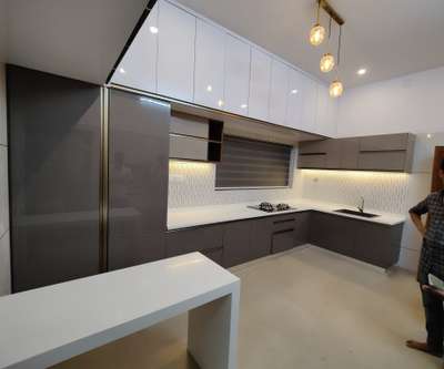 Storage, Lighting, Kitchen Designs by Interior Designer Caprio Interiors, Kannur | Kolo