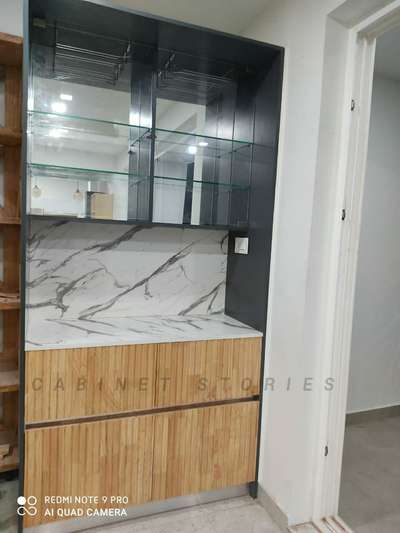 Wall, Storage Designs by Interior Designer CABINET stories 9495011585, Thrissur | Kolo