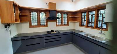 Kitchen, Storage Designs by Interior Designer Vipin Decus Interiors, Thiruvananthapuram | Kolo