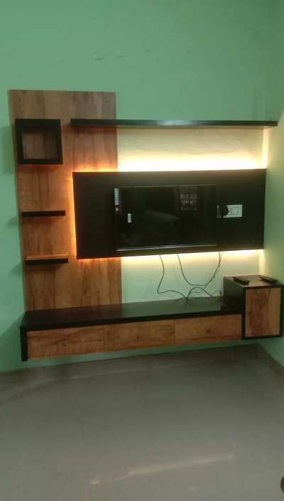 Living, Storage, Lighting Designs by Interior Designer ഇന്റീരിയ  പ്ലാന്റ്സ് , Wayanad | Kolo