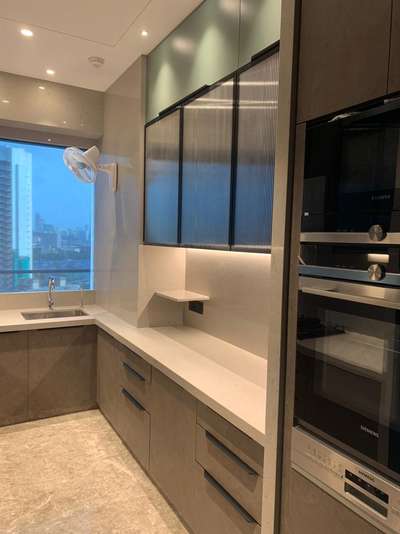 Kitchen, Lighting, Storage Designs by Interior Designer CABINET stories 9495011585, Thrissur | Kolo