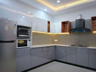 Kitchen, Storage Designs by Interior Designer sreesh kumar, Kottayam | Kolo
