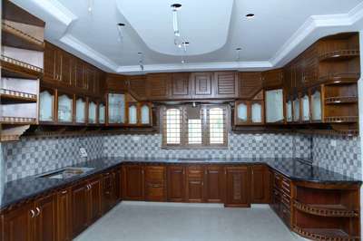 Kitchen, Storage Designs by Contractor Tensio Homes , Thiruvananthapuram | Kolo