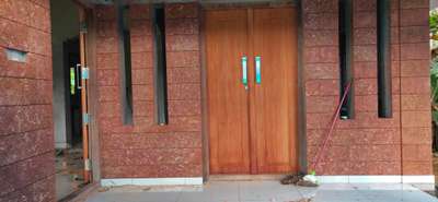 Door Designs by Service Provider dk Laterite cladding , Malappuram | Kolo
