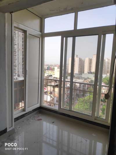 Window Designs by Interior Designer Aluminium and Glass Pvc panel, Delhi | Kolo