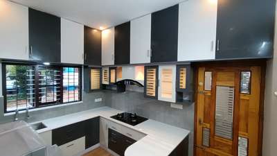 Kitchen, Lighting, Storage Designs by Carpenter Kunnuvila sudheesh, Thiruvananthapuram | Kolo