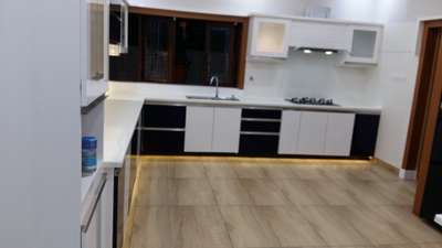 Kitchen, Flooring Designs by Interior Designer haris v p haris payyanur, Kannur | Kolo