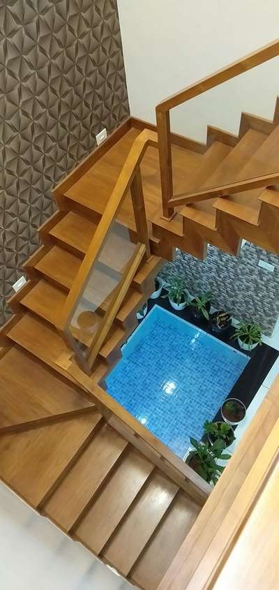 Staircase Designs by Carpenter saji saji, Malappuram | Kolo
