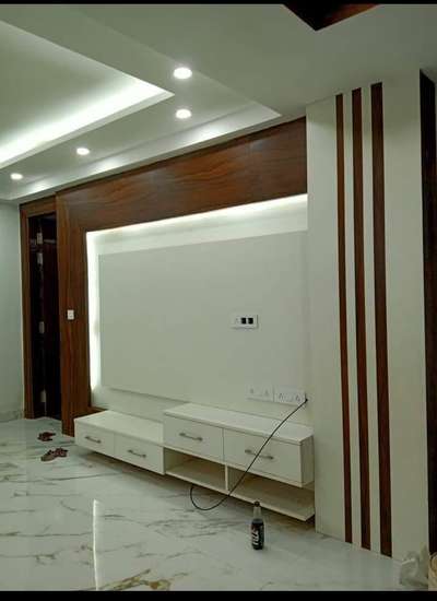 Living, Storage, Lighting Designs by Interior Designer santhosh kumar, Kottayam | Kolo