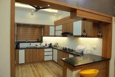 Lighting, Kitchen, Storage Designs by Interior Designer kallunkal  interiors, Kannur | Kolo