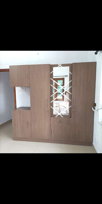 Storage Designs by Interior Designer Navas Basheer, Kottayam | Kolo