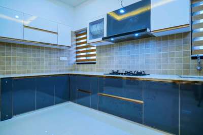 Kitchen, Lighting, Storage Designs by Interior Designer sajeesh athavanad, Malappuram | Kolo