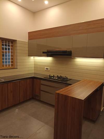 Kitchen, Lighting, Storage Designs by Interior Designer Tiara Decors, Pathanamthitta | Kolo