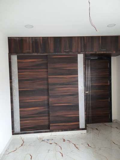 Flooring, Storage Designs by Carpenter ഹിന്ദി Carpenters 99 272 888 82, Ernakulam | Kolo