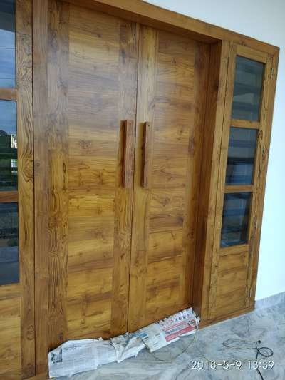 Door Designs by Carpenter Saneesh Kumar, Kannur | Kolo