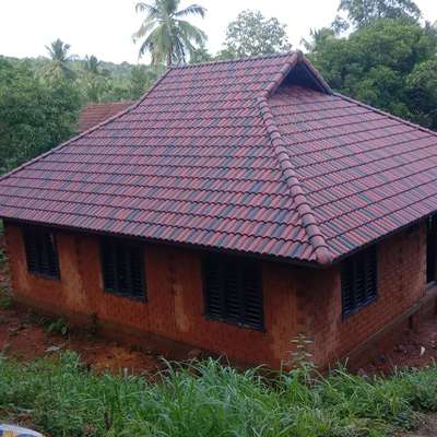 Roof Designs by Building Supplies Ashraf  Ashru, Malappuram | Kolo