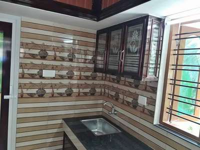 Kitchen, Storage Designs by Flooring rajesh babukuttan, Thiruvananthapuram | Kolo
