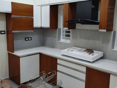 Kitchen, Storage Designs by Interior Designer GEORGE  irinjalakuda, Thrissur | Kolo