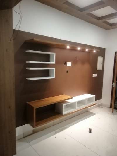 Living, Storage Designs by Interior Designer Homely Heaven  Homely Heaven , Malappuram | Kolo