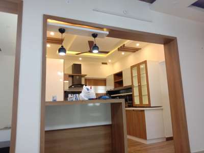 Kitchen, Lighting, Storage Designs by Interior Designer Sebastian Pg, Alappuzha | Kolo