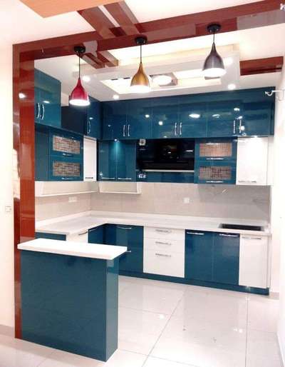 Kitchen, Lighting, Storage Designs by Interior Designer Qbic Builders  Interiors Office Arakkakafav, Ernakulam | Kolo