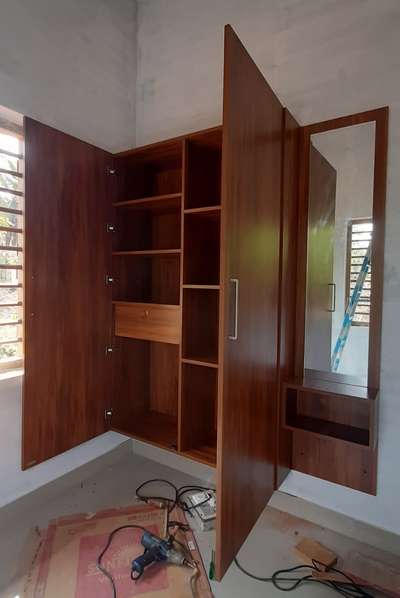 Storage Designs by Interior Designer Baiju T, Malappuram | Kolo
