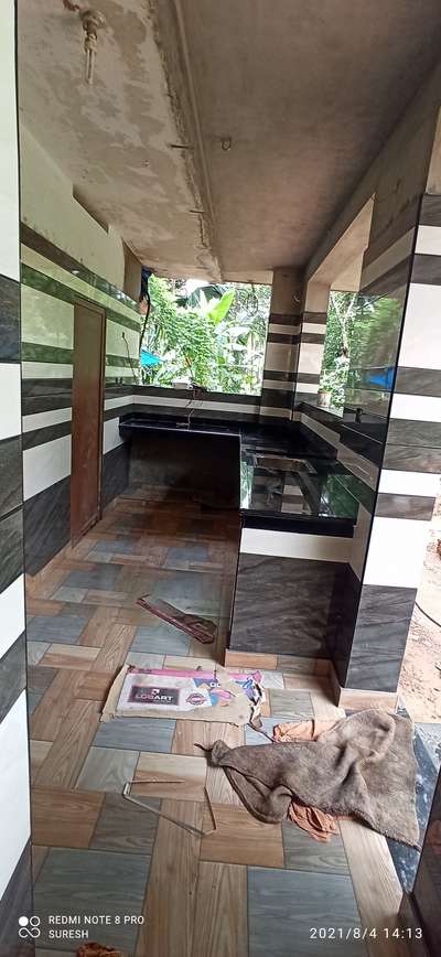 Kitchen, Storage, Flooring Designs by Flooring Suresh Poovadan, Kannur | Kolo