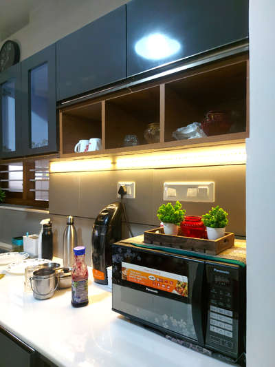 Kitchen, Lighting, Storage Designs by Interior Designer nisam pt, Malappuram | Kolo